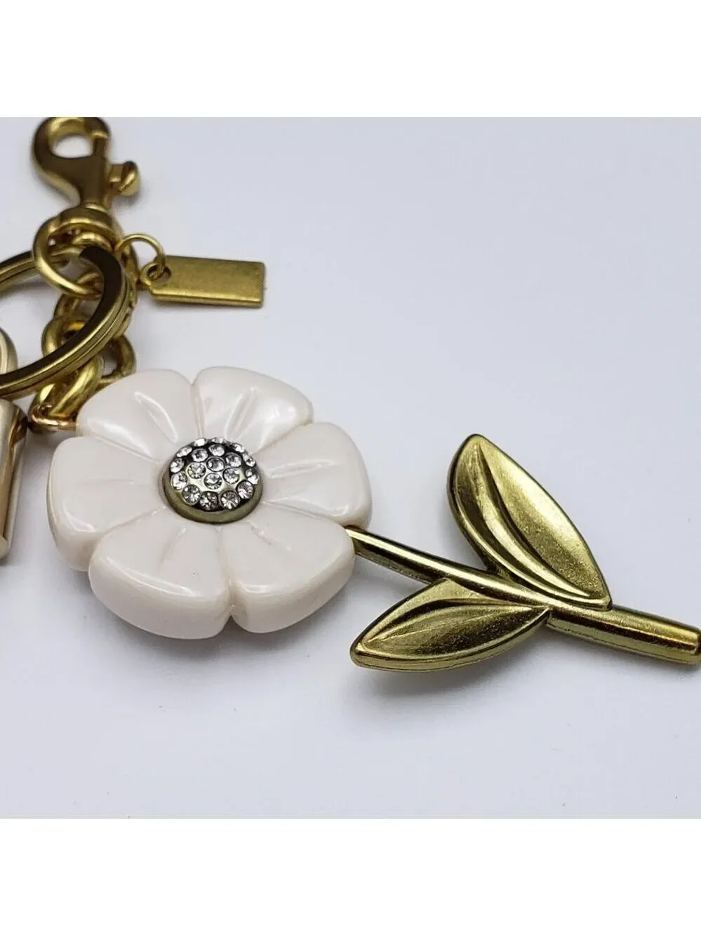 Authentic Louis Vuitton Lock & Key with Unbranded Flower Charm, Keychain